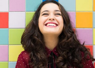 1000 happy woman on colorful background.jpg