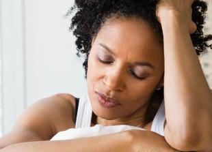 O sad black woman on bed facebook.jpg